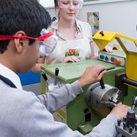 The use of specific machinery and equipment by students in school workshops