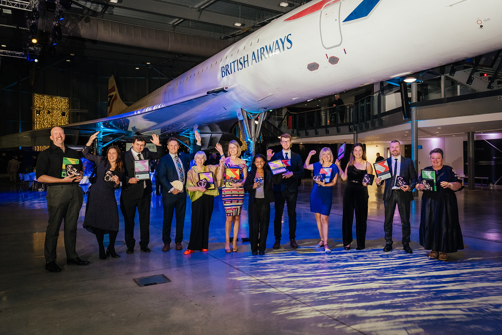 Winners from the 2023 Awards standing in front of the Concorde