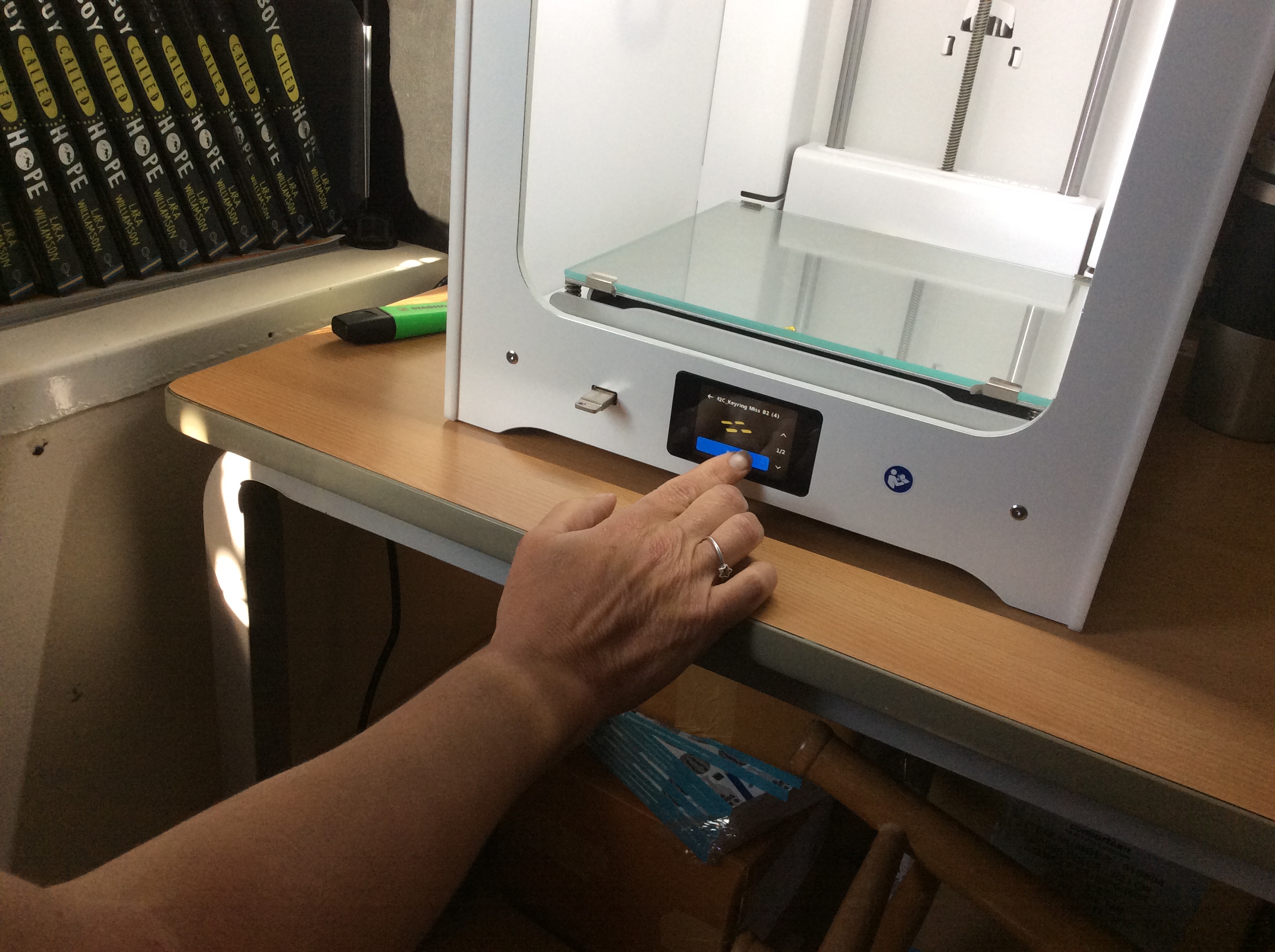 Someone using a 3D printer