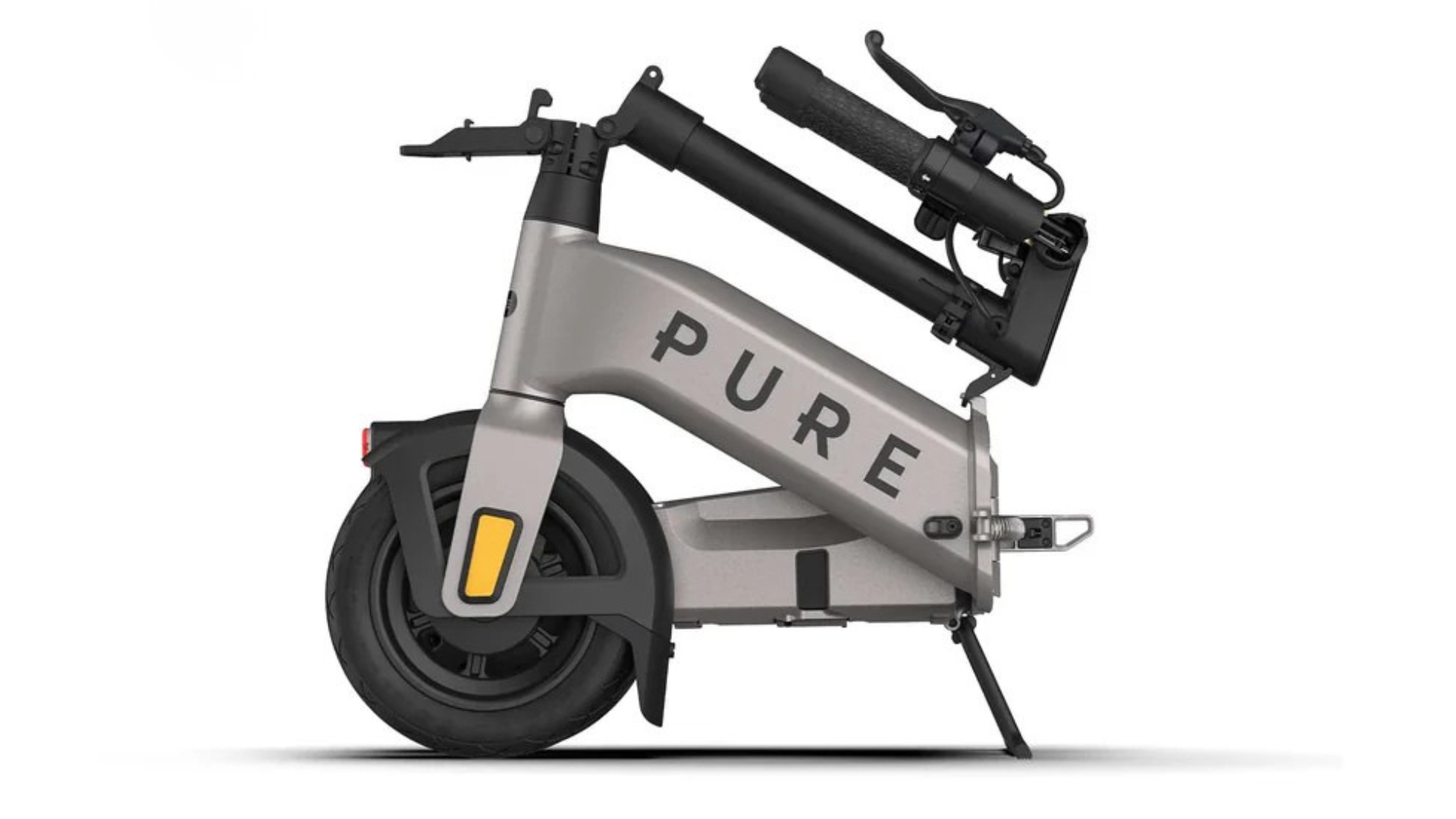 Folded PURE electric scooter shown in side profile, highlighting the compact frame, front wheel, folding handlebar mechanism, and kickstand.