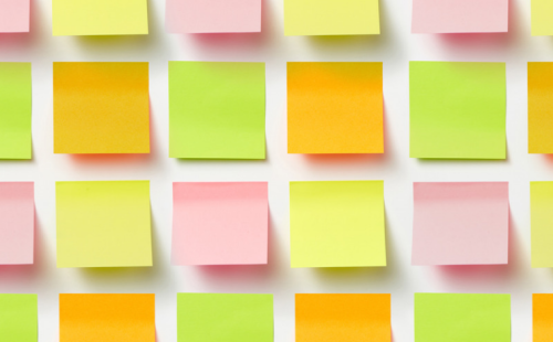 The image shows many colourful sticky notes arranged on a white background, creating a bright, organized brainstorming-style composition.
